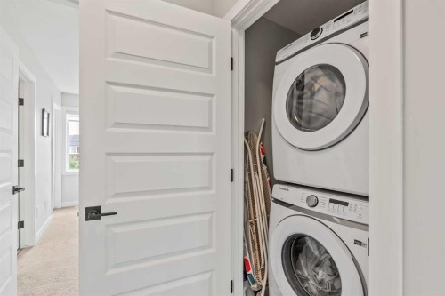 182 River Heights Drive, Cochrane, AB - Indoor Photo Showing Laundry Room