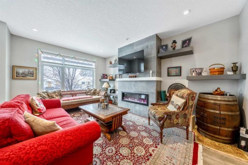 1514 33 Avenue Sw, Calgary, AB - Indoor Photo Showing Living Room With Fireplace