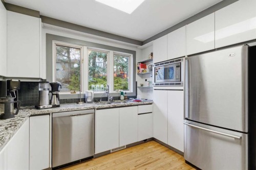2910 Marquette Street Sw, Calgary, AB - Indoor Photo Showing Kitchen With Stainless Steel Kitchen With Double Sink