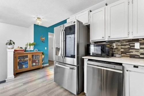 236 Mckerrell Way Se, Calgary, AB - Indoor Photo Showing Kitchen With Stainless Steel Kitchen