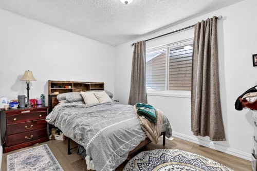 236 Mckerrell Way Se, Calgary, AB - Indoor Photo Showing Bedroom