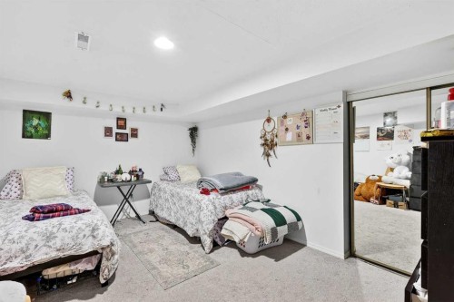 236 Mckerrell Way Se, Calgary, AB - Indoor Photo Showing Bedroom
