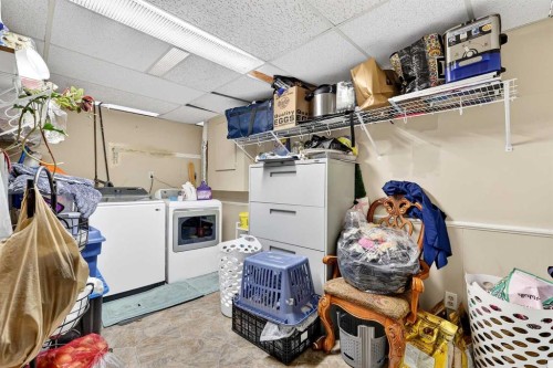 236 Mckerrell Way Se, Calgary, AB - Indoor Photo Showing Laundry Room