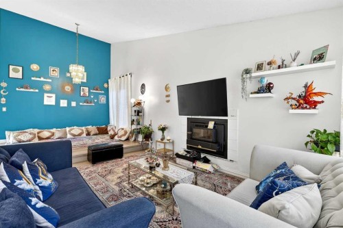 236 Mckerrell Way Se, Calgary, AB - Indoor Photo Showing Living Room