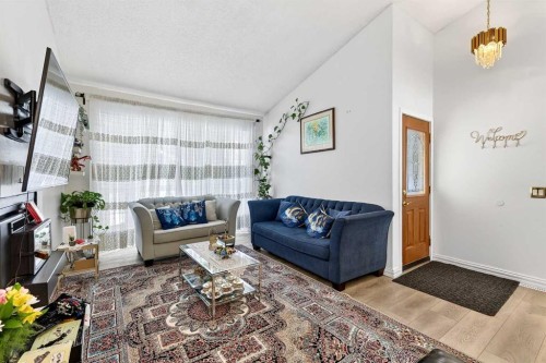 236 Mckerrell Way Se, Calgary, AB - Indoor Photo Showing Living Room