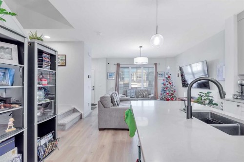 371 Fireside Way, Cochrane, AB - Indoor Photo Showing Kitchen With Double Sink