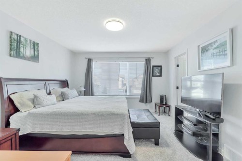 371 Fireside Way, Cochrane, AB - Indoor Photo Showing Bedroom