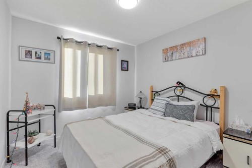 371 Fireside Way, Cochrane, AB - Indoor Photo Showing Bedroom