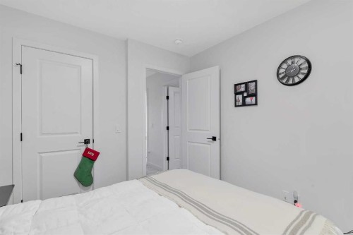 371 Fireside Way, Cochrane, AB - Indoor Photo Showing Bedroom