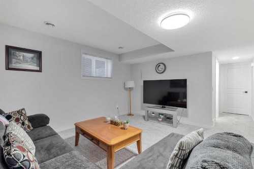 371 Fireside Way, Cochrane, AB - Indoor Photo Showing Living Room