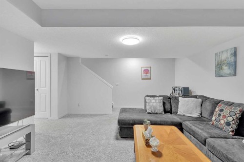 371 Fireside Way, Cochrane, AB - Indoor Photo Showing Living Room