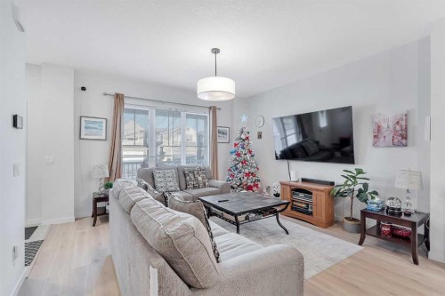 371 Fireside Way, Cochrane, AB - Indoor Photo Showing Living Room