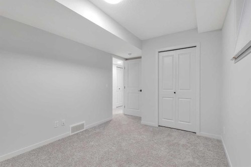 371 Fireside Way, Cochrane, AB - Indoor Photo Showing Other Room