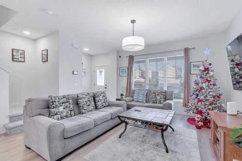 371 Fireside Way, Cochrane, AB - Indoor Photo Showing Living Room