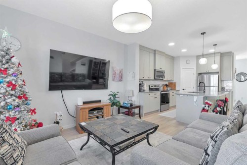 371 Fireside Way, Cochrane, AB - Indoor Photo Showing Living Room