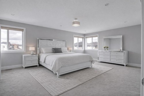 302 Kinniburgh Rd, Chestermere, AB - Indoor Photo Showing Bedroom