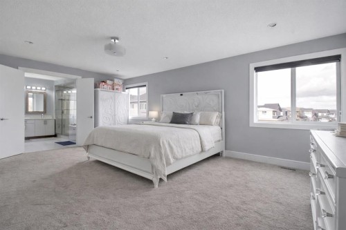 302 Kinniburgh Rd, Chestermere, AB - Indoor Photo Showing Bedroom