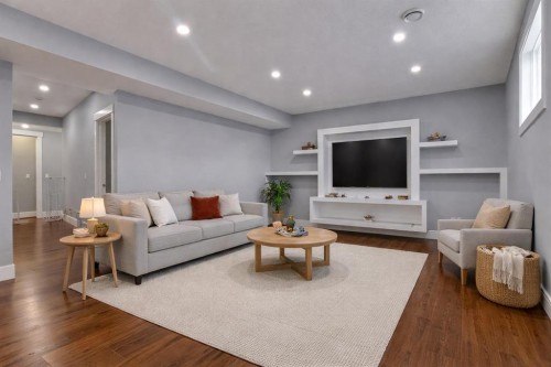 302 Kinniburgh Rd, Chestermere, AB - Indoor Photo Showing Living Room