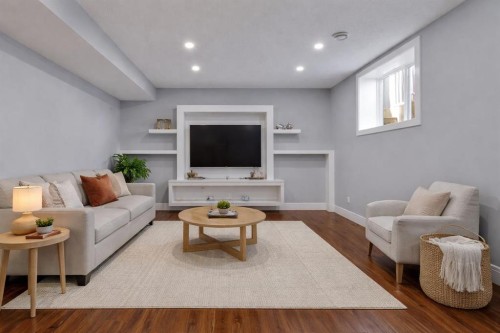 302 Kinniburgh Rd, Chestermere, AB - Indoor Photo Showing Living Room