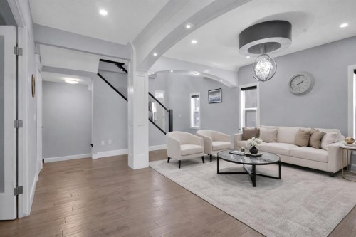 302 Kinniburgh Rd, Chestermere, AB - Indoor Photo Showing Living Room