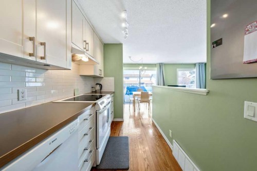 50 Cedarwood Rise Sw, Calgary, AB - Indoor Photo Showing Kitchen With Upgraded Kitchen