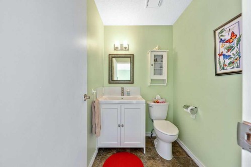 50 Cedarwood Rise Sw, Calgary, AB - Indoor Photo Showing Bathroom