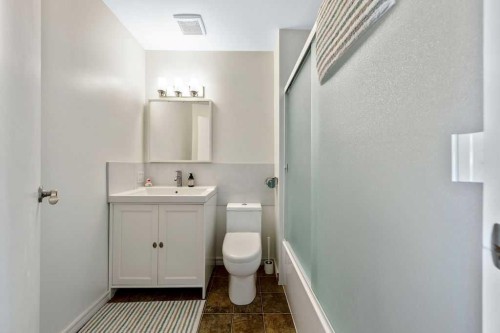 50 Cedarwood Rise Sw, Calgary, AB - Indoor Photo Showing Bathroom