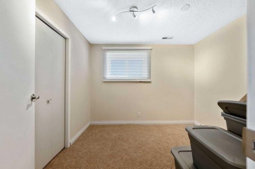 50 Cedarwood Rise Sw, Calgary, AB - Indoor Photo Showing Other Room