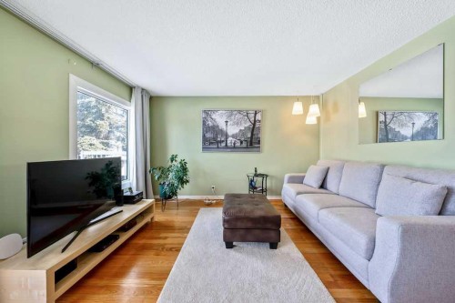 50 Cedarwood Rise Sw, Calgary, AB - Indoor Photo Showing Living Room