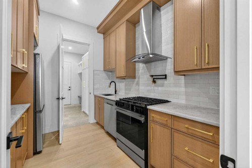 960 South Shore Terrace, Chestermere, AB - Indoor Photo Showing Kitchen With Upgraded Kitchen