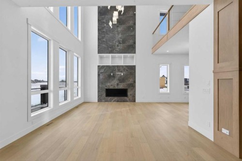 960 South Shore Terrace, Chestermere, AB - Indoor Photo Showing Living Room With Fireplace