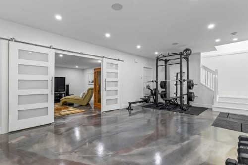 511 7 Street Ne, Calgary, AB - Indoor Photo Showing Gym Room
