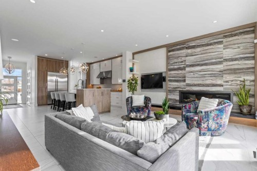 511 7 Street Ne, Calgary, AB - Indoor Photo Showing Other Room With Fireplace