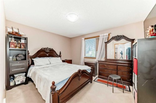 16062 Everstone Road Sw, Calgary, AB - Indoor Photo Showing Bedroom