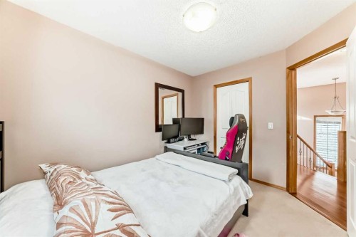 16062 Everstone Road Sw, Calgary, AB - Indoor Photo Showing Bedroom