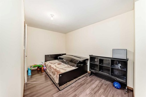 16062 Everstone Road Sw, Calgary, AB - Indoor Photo Showing Bedroom