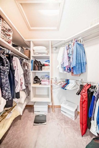 220 Rocky Ridge Villas Nw, Calgary, AB - Indoor With Storage