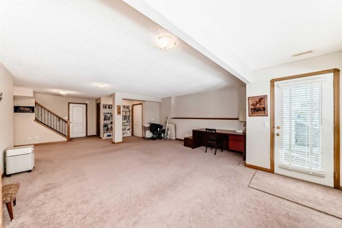 220 Rocky Ridge Villas Nw, Calgary, AB - Indoor Photo Showing Other Room