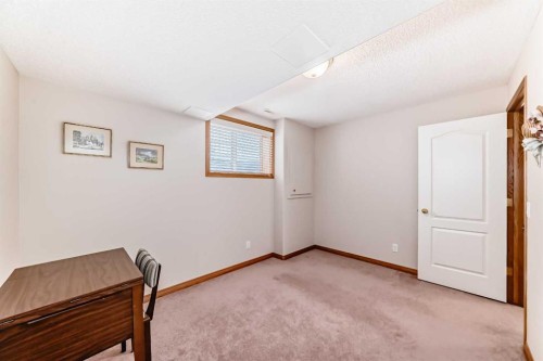 220 Rocky Ridge Villas Nw, Calgary, AB - Indoor Photo Showing Other Room