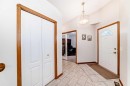 220 Rocky Ridge Villas Nw, Calgary, AB  - Indoor Photo Showing Other Room 
