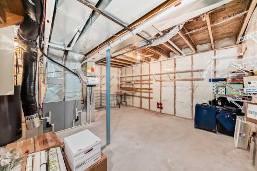 220 Rocky Ridge Villas Nw, Calgary, AB - Indoor Photo Showing Basement