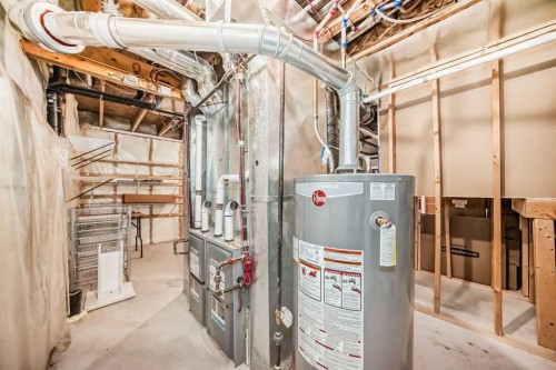 220 Rocky Ridge Villas Nw, Calgary, AB - Indoor Photo Showing Basement