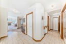 220 Rocky Ridge Villas Nw, Calgary, AB  - Indoor Photo Showing Other Room 