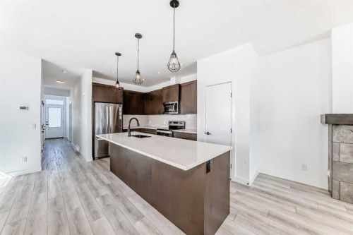 357 Calhoun Common Ne, Calgary, AB - Indoor Photo Showing Kitchen With Upgraded Kitchen