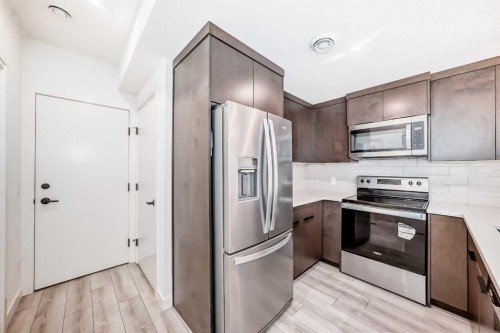 357 Calhoun Common Ne, Calgary, AB - Indoor Photo Showing Kitchen