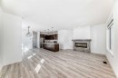 357 Calhoun Common Ne, Calgary, AB  - Indoor Photo Showing Living Room With Fireplace 