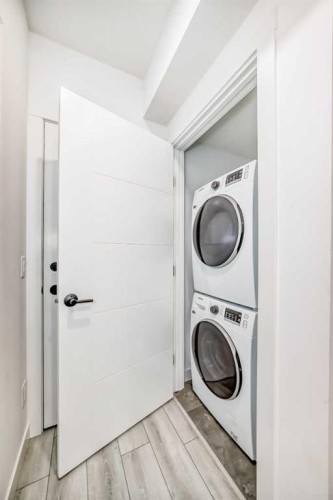 357 Calhoun Common Ne, Calgary, AB - Indoor Photo Showing Laundry Room