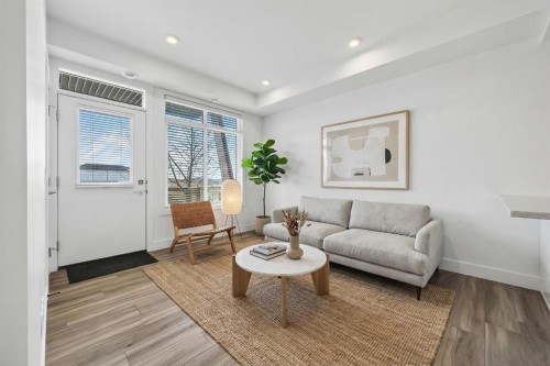 214 Seton Passage Se, Calgary, AB - Indoor Photo Showing Living Room