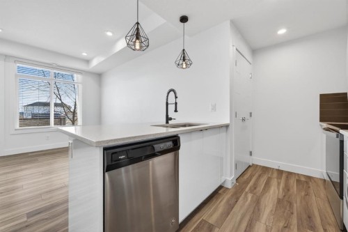 214 Seton Passage Se, Calgary, AB - Indoor Photo Showing Kitchen