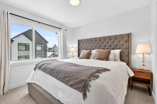 10 Currie Walk Sw, Calgary, AB - Indoor Photo Showing Bedroom